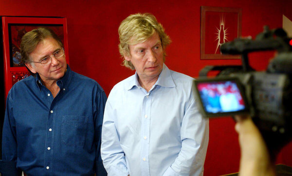 "American Idol" producers Ken Warwick, left, and Nigel Lythgoe are exiting the singing contest, Fox said Sunday.