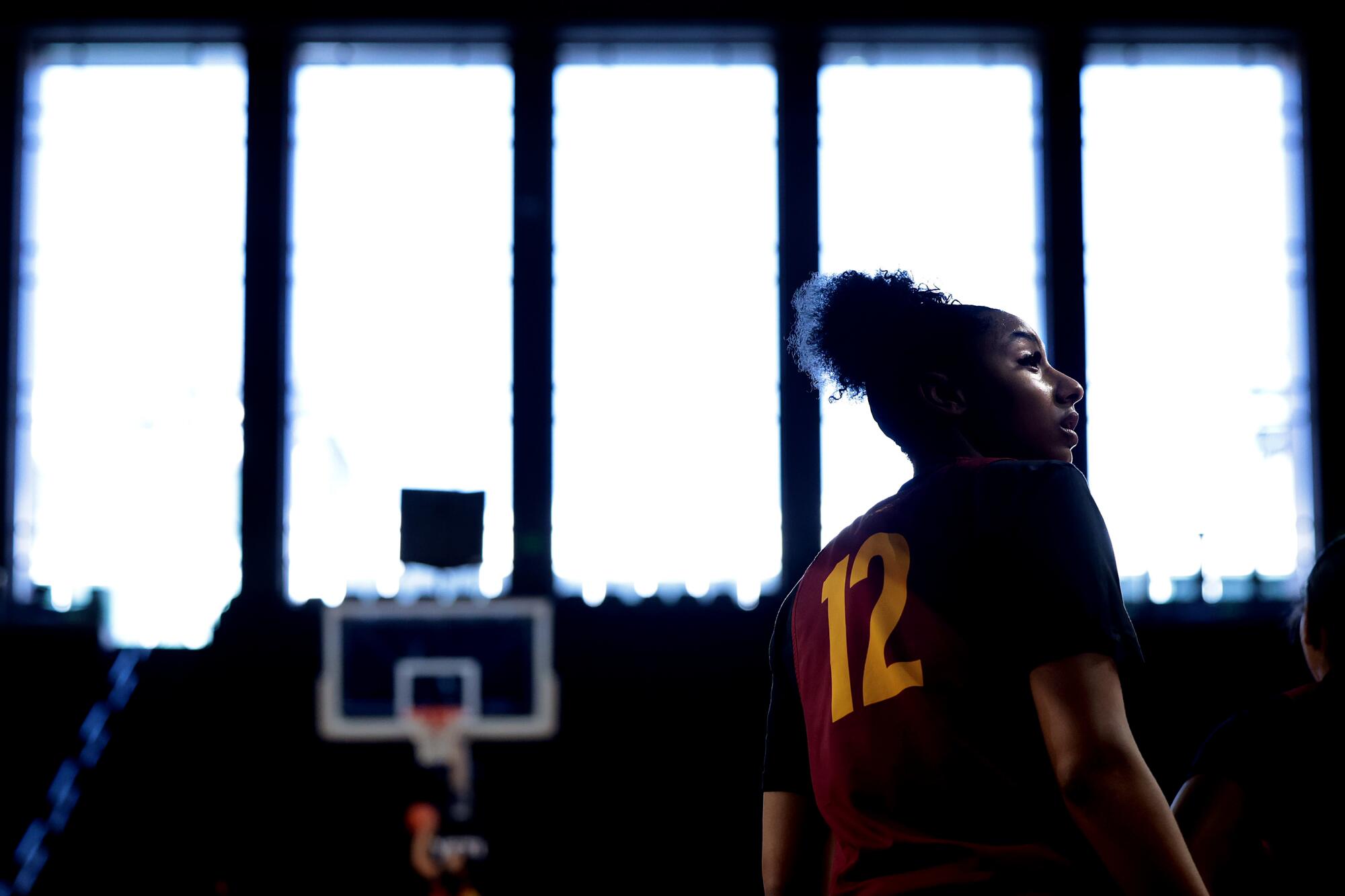USC freshman guard Juju Watkins stands on the court at the Galen Center during practice Thursday.