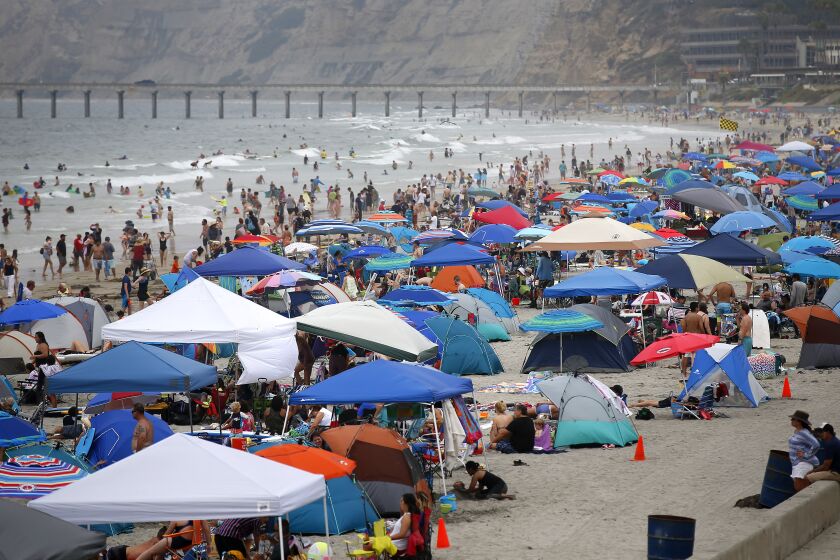 Thousands of beach goers lined the San Diego coast at La Jolla Shores as temperatures soared inland on Sunday, Sept. 1, 2019.