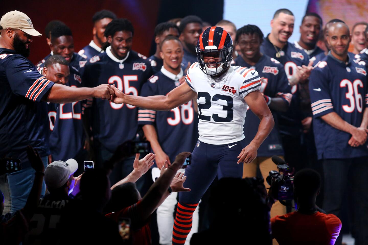 Chicago Bears player Kyle Fuller shows off a new jersey during the Bears100 Celebration Weekend at the Donald E. Stephens Convention Center in Rosemont on Friday, June 7, 2019. (Chris Sweda/Chicago Tribune)