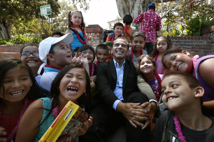 Mayor Antonio Villaraigosa poses with students from Hazeltine Avenue Elementary. His inability to gain control of L.A. Unified was a notable setback.
