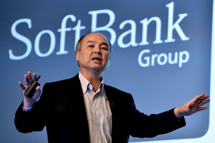 (FILES) This file photo taken on July 28, 2016 shows SoftBank Group Representative Masayoshi Son speaking during a press conference to announce the company's financial results in Tokyo. The 60-year-old tycoon Son, who is listed by Forbes as Japan's richest man with an estimated fortune of 22.2 billion USD, has embarked on a furious spree of purchases culminating in December 28, 2017 deal to take a hefty stake in ride-sharing app Uber. / AFP PHOTO / KAZUHIRO NOGIKAZUHIRO NOGI/AFP/Getty Images ** OUTS - ELSENT, FPG, CM - OUTS * NM, PH, VA if sourced by CT, LA or MoD ** ** OUTS - ELSENT, FPG, CM - OUTS * NM, PH, VA if sourced by CT, LA or MoD **