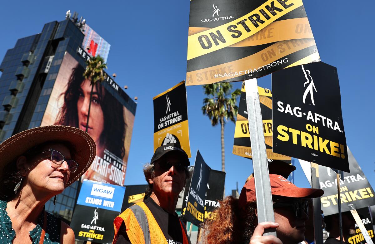 SAG-AFTRA members and supporters picket on October 12, 2023 in Los Angeles, Calif.