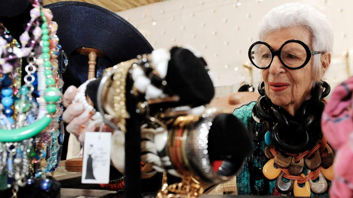 Fashion icon Iris Apfel, shown here shopping in Los Angeles, will be one of the featured experts on an upcoming Cunard cruise.