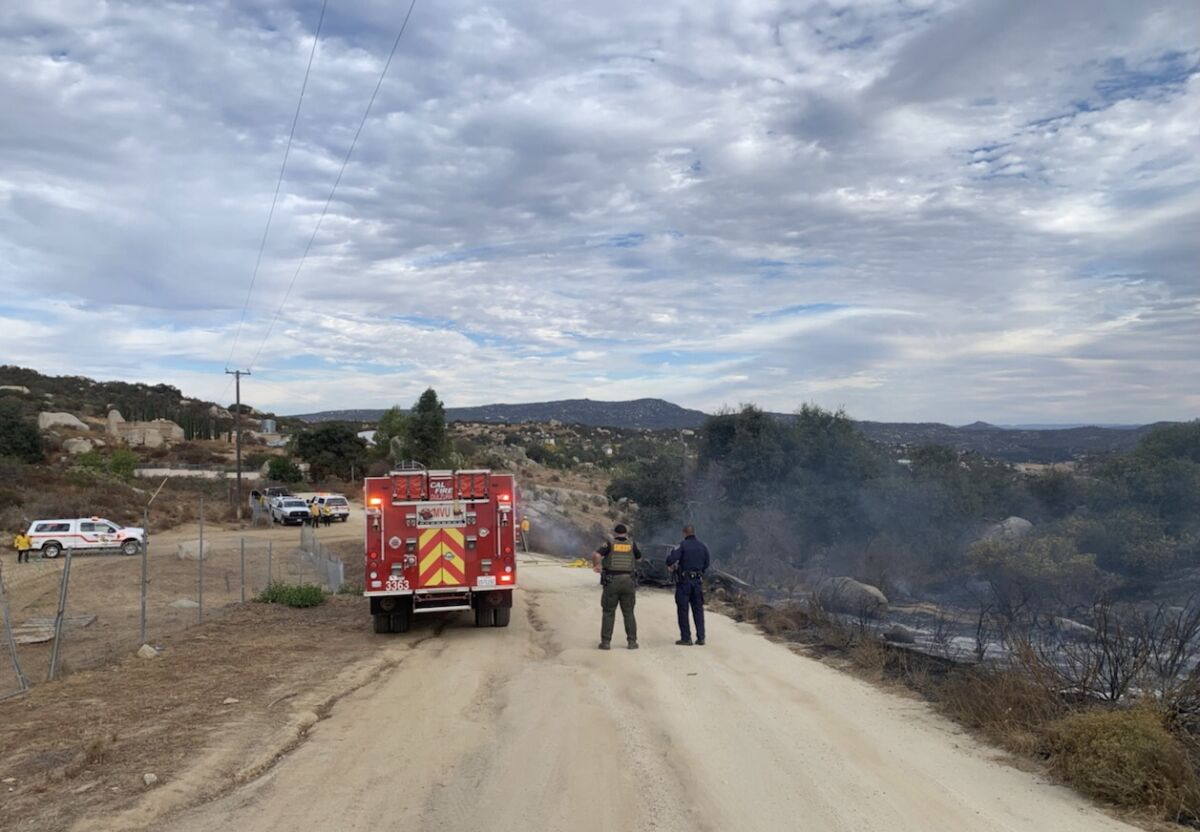 Authorities responding to a report of a fire Thursday near Potrero found a body in a vehicle near where the blaze started.