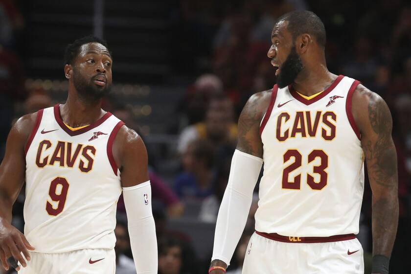 CLEVELAND, OH - OCTOBER 10: Dwyane Wade #9 of the Cleveland Cavaliers talks with LeBron James #23 while playing the Chicago Bulls during a pre season game at Quicken Loans Arena on October 10, 2017 in Cleveland, Ohio. NOTE TO USER: User expressly acknowledges and agrees that, by downloading and or using this photograph, User is consenting to the terms and conditions of the Getty Images License Agreement. (Photo by Gregory Shamus/Getty Images) ** OUTS - ELSENT, FPG, CM - OUTS * NM, PH, VA if sourced by CT, LA or MoD **