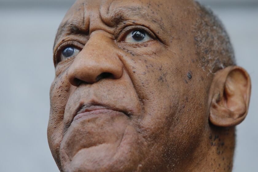 TOPSHOT - Bill Cosby exits the courthouse after a mistrial on the sixth day of jury deliberations of his sexual assault trial at the Montgomery County Courthouse on June 17, 2017 in Norristown, Pennsylvania. A US judge declared a mistrial in Bill Cosby's sexual assault case after the jury announced that they remained deadlocked and unable to reach a verdict against the fallen television star. / AFP PHOTO / EDUARDO MUNOZ ALVAREZ (Photo credit should read EDUARDO MUNOZ ALVAREZ/AFP via Getty Images)