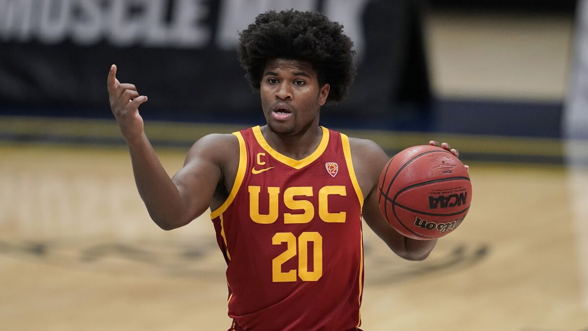 USC guard Ethan Anderson plays against California.