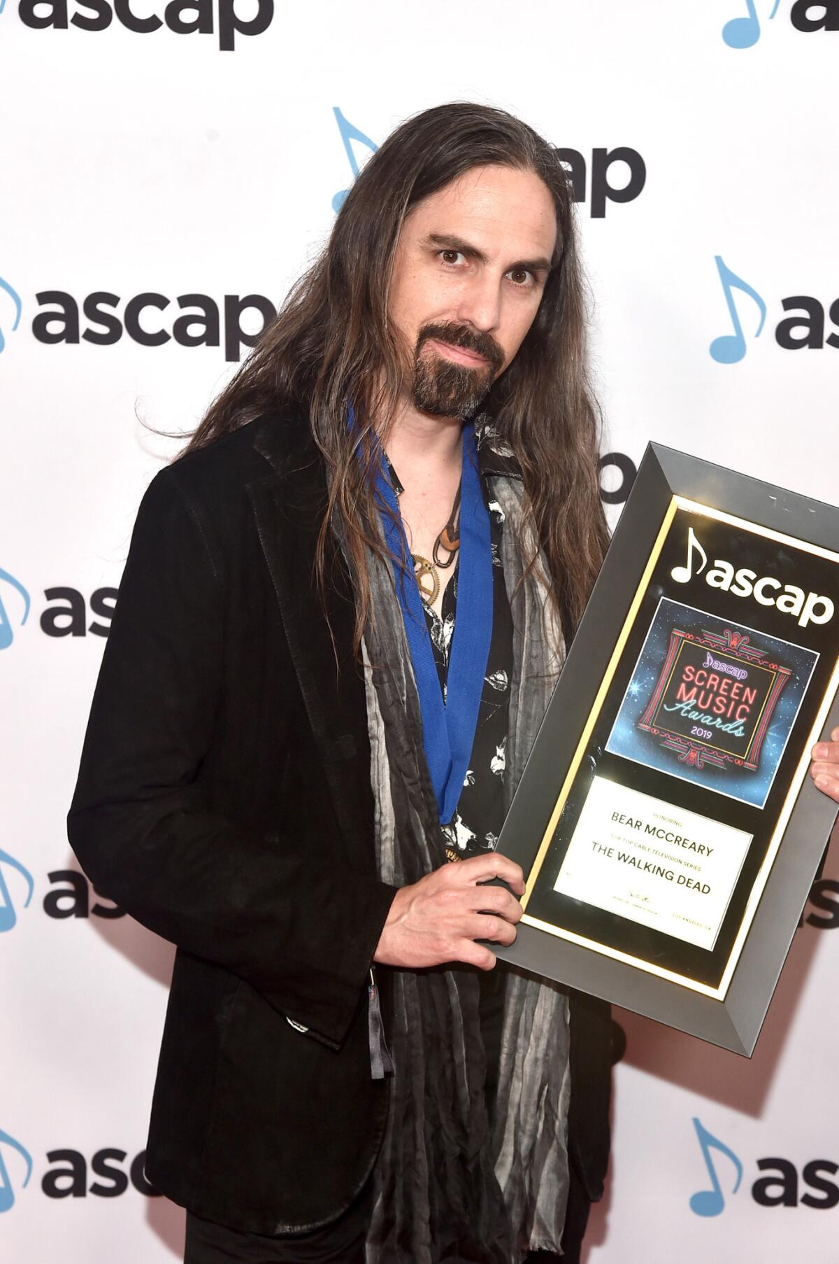 Composer Bear McCreary won the award for cable television series for "The Walking Dead."