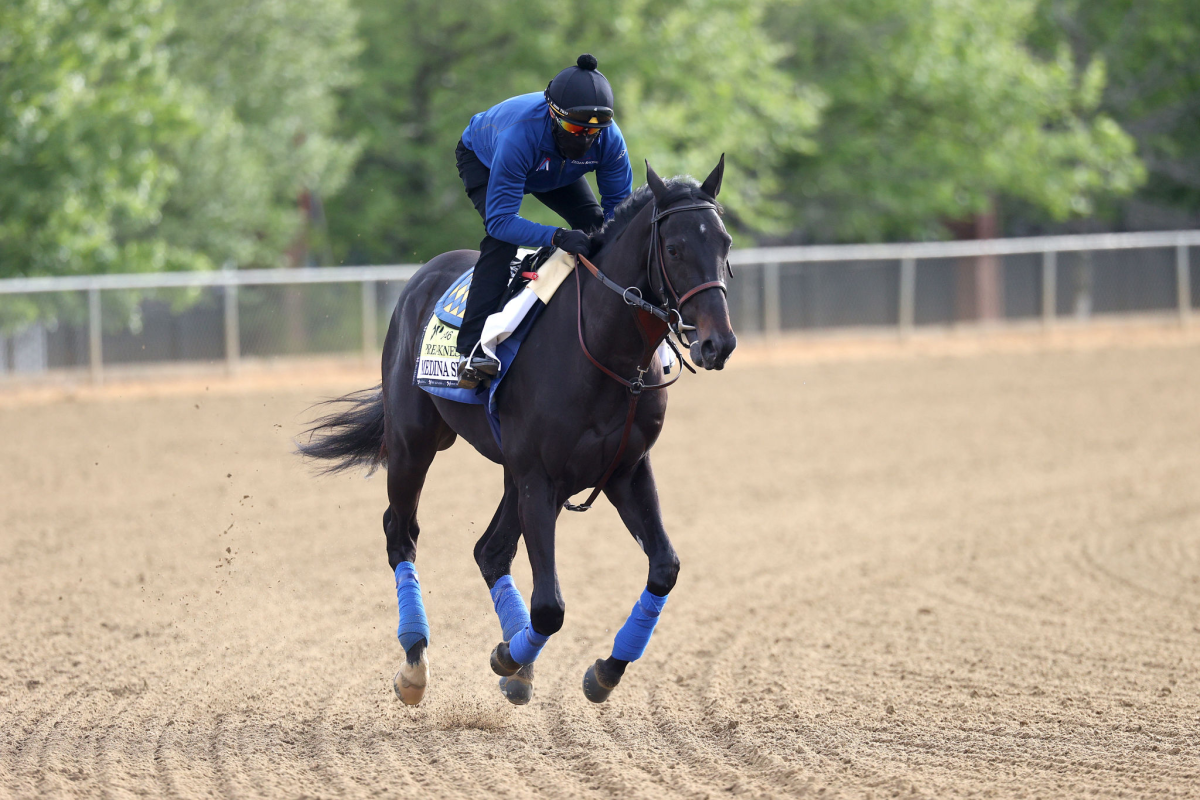 Exercise rider Humberto Gomez is aboard Medina Spirit in May, 2021.