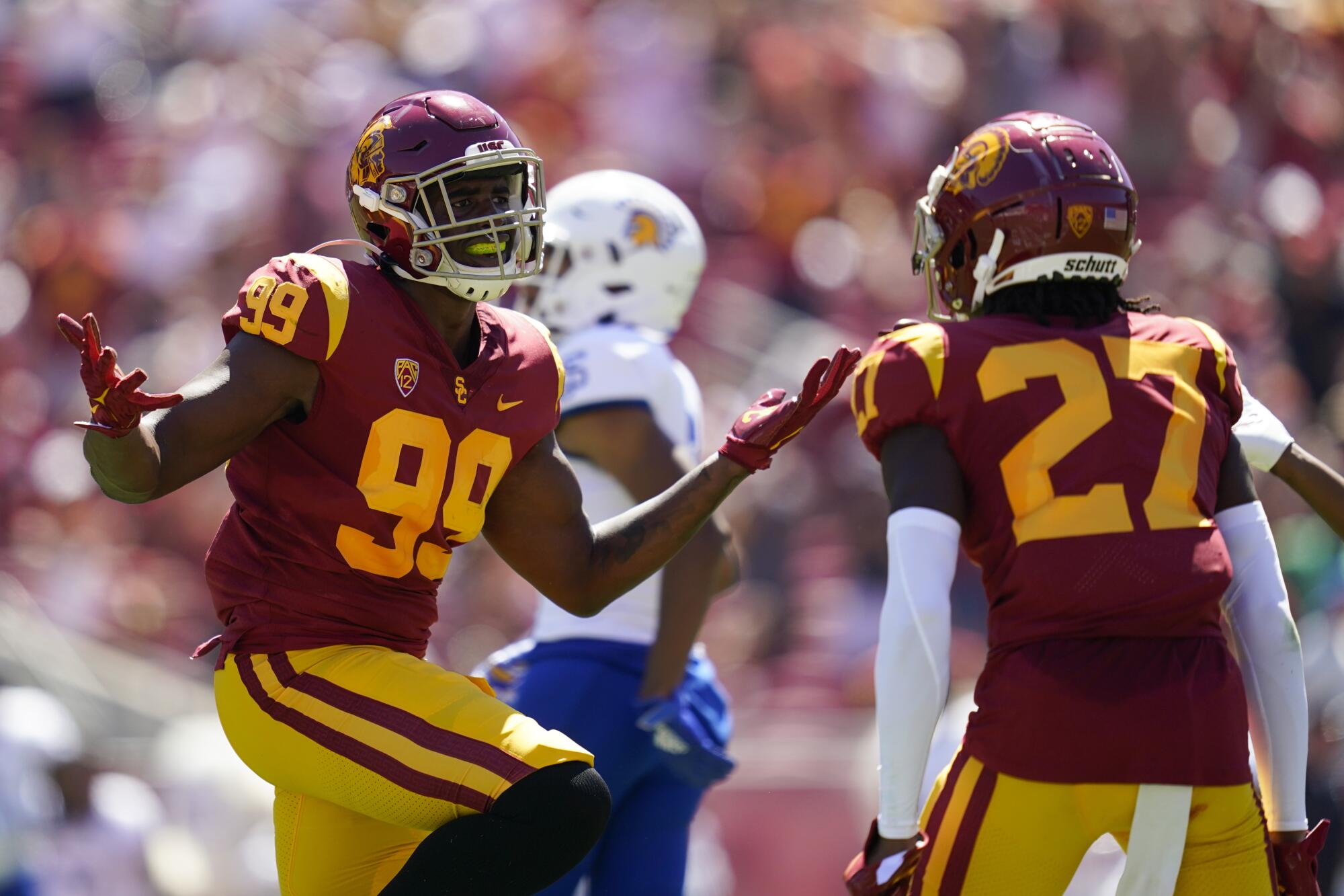 USC linebacker Drake Jackson (99) celebrates after an interception