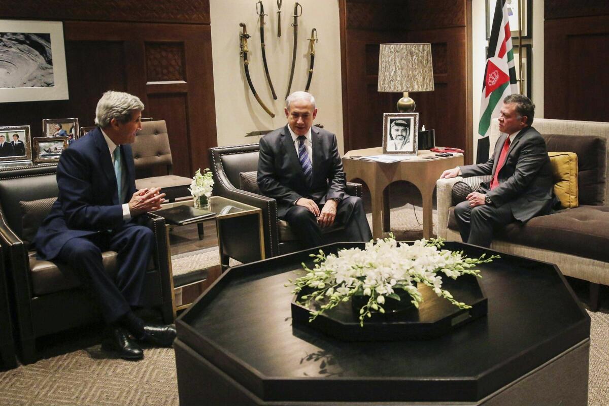 This 2014 photo shows U.S. Secretary of State John Kerry, Israeli Prime Minister Benjamin Netanyahu and Jordanian King Abdullah II meeting in Amman, Jordan, also to discuss ways to restore unrest in Jerusalem.