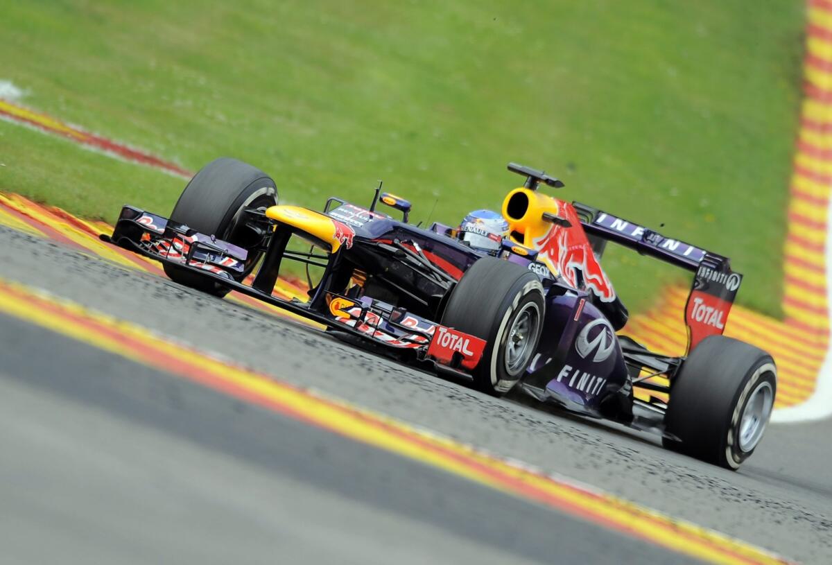 Red Bull Racing's Sebastian Vettel increased his lead in the Formula One world championship standings with a win in the Grand Prix of Belgium on Sunday.