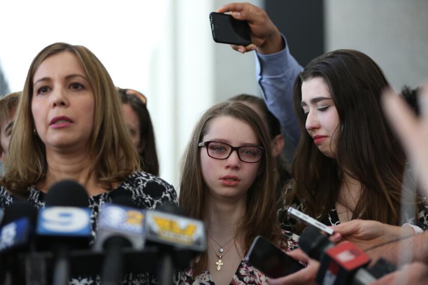 Patti Blagojevich, left, speaks to the media along with daughters Annie, center, and Amy after the resentencing of her husband on Aug. 9, 2016, at the Dirksen U.S. Courthouse in Chicago.