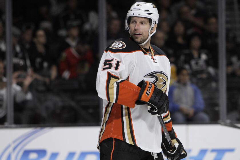 Dany Heatley questions an official during the game against the Kings at Staples Center on Sept. 24.