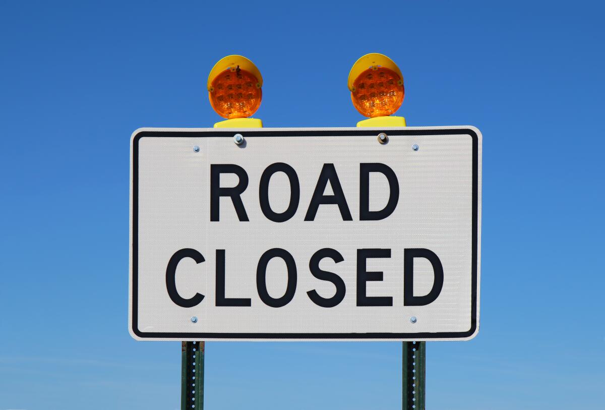 Road closed sign