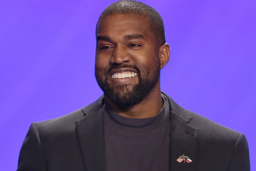 FILE - This Nov. 17, 2019, file photo shows Kanye West on stage during a service at Lakewood Church in Houston. West will be on the Oklahoma presidential election ballot, as Oklahoma Board of Elections spokeswoman Misha Mohr says a West representative filed the necessary paperwork and paid the $35,000 filing Wednesday, July 15, 2020, to go on the state's Nov. 3 presidential ballot. (AP Photo/Michael Wyke, File)