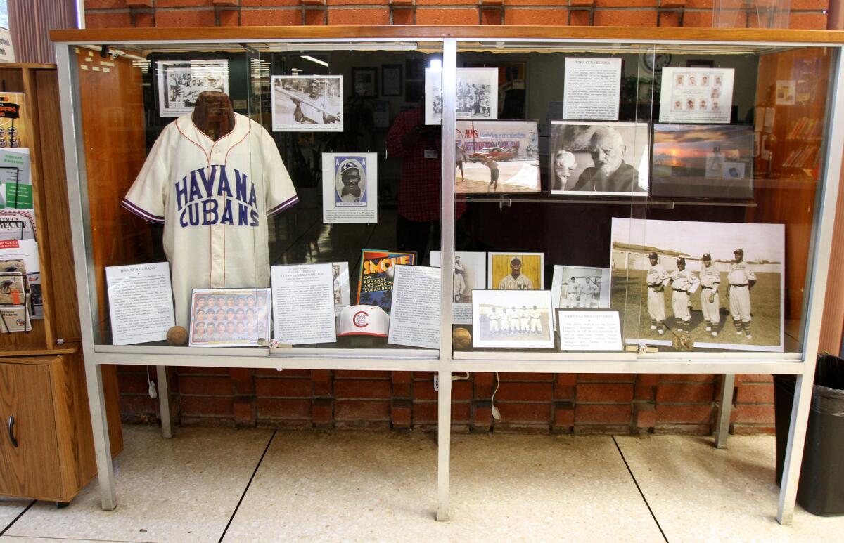 Cuban baseball memorabilia is on display at the Burbank Central Library as part of an exhibit called Feeling the "Heat: Cuba's Baseball Heritage."