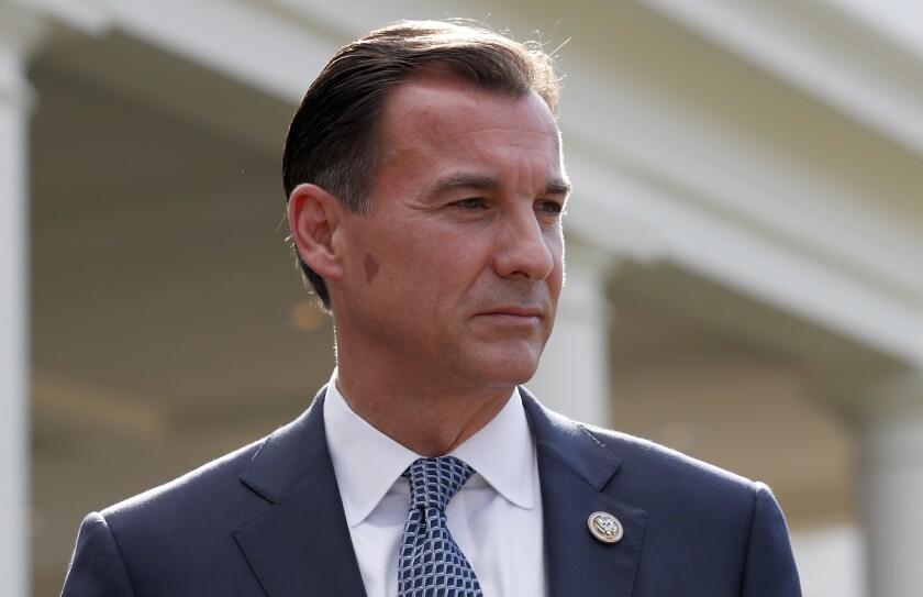 FILE - Rep. Thomas Suozzi, D-N.Y., pauses while speaking with the media, Sept. 13, 2017, in Washington. Suozzi is joining a competitive primary race for New York governor that became wide open when Andrew Cuomo resigned. Suozzi told reporters at a virtual news conference Monday, Nov. 29, 2021 that he's jumping into the 2022 race. (AP Photo/Alex Brandon, File)