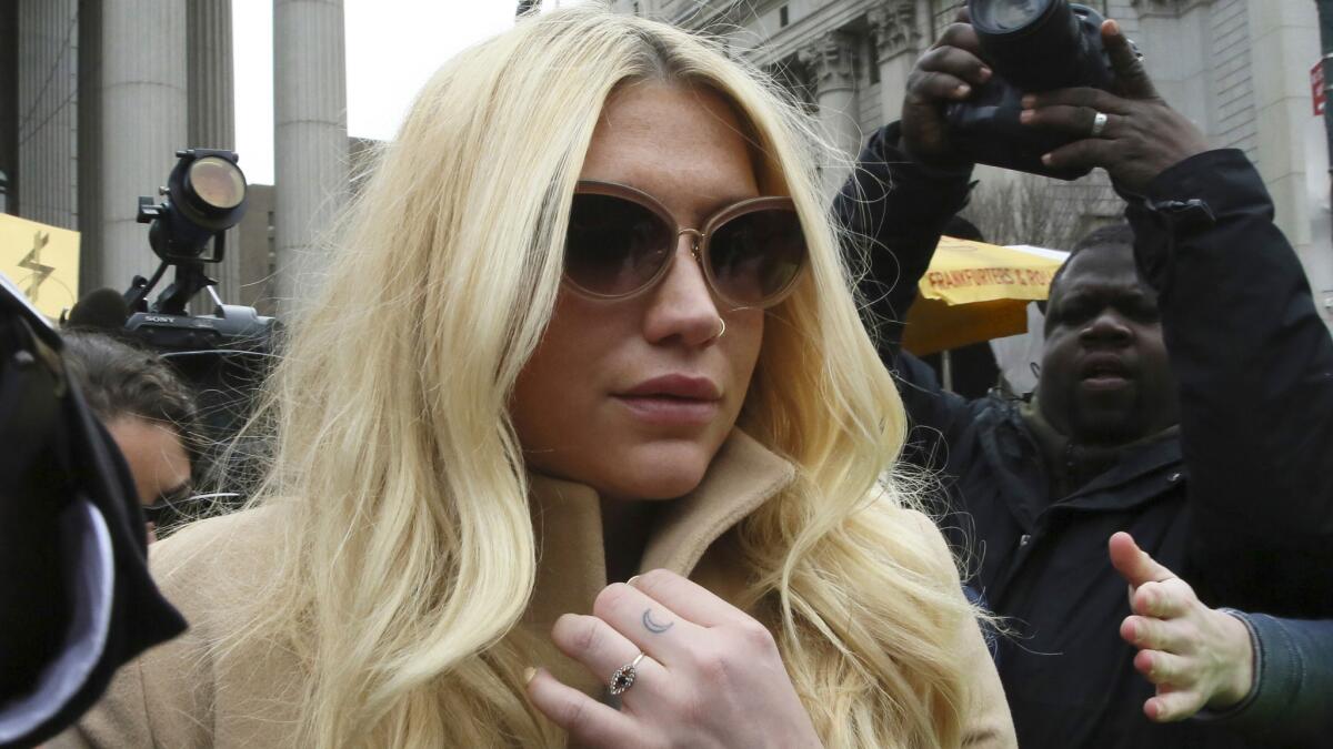 Kesha leaves a courthouse in New York in February.