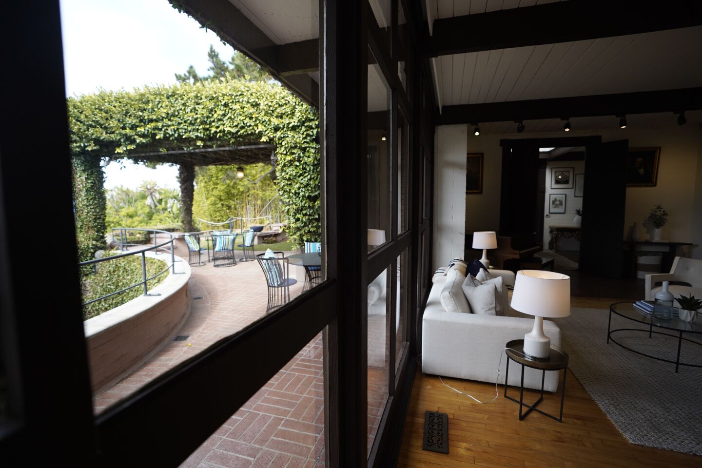 San Diego, California - December 02: The historic home of oceanographer Walter Munk. Inside the living room area looking towards the back yard at La Jolla Shores on Thursday, Dec. 2, 2021 in San Diego, California. (Alejandro Tamayo / The San Diego Union-Tribune)