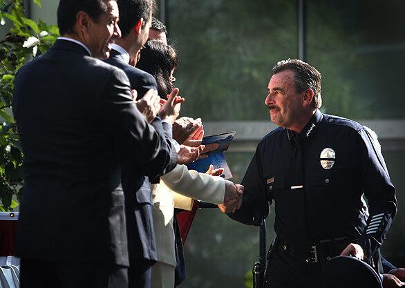 Los Angeles Police Chief Charlie Beck thanks City Council members and other dignitaries following his remarks at a swearing-in ceremony at LAPD headquarters. The event was largely for show and celebration, as Beck was officially sworn in a few weeks ago.