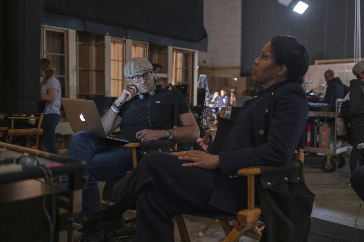 Damon Lindelof and Regina King on the set of HBO's "Watchmen." 