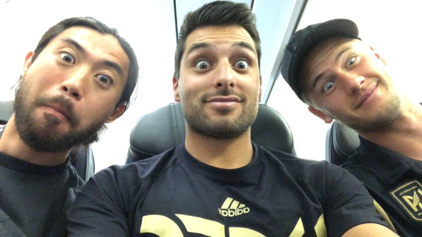 Head performance coach Daniel Guzman, center, is joined by former LAFC players Lee Nguyen, left, and Walker Zimmerman for a Twitter pic.
