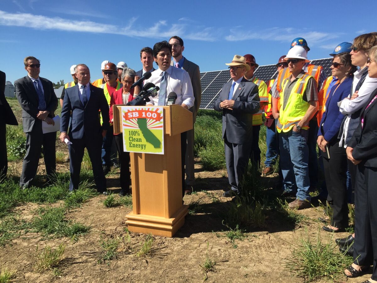Senate leader Kevin de León announces Senate Bill 100 at a solar farm in Davis in May.