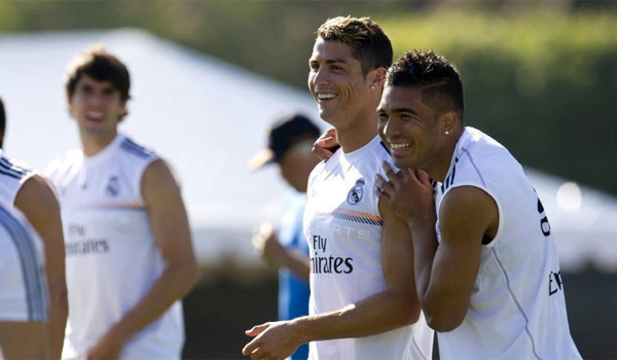 Cristiano Ronaldo, left, and Carlos Henrique Casimiro, right, attend a Real Madrid training session at UCLA ahead of the team's matchup with the L.A. Galaxy on Aug. 3 at the Guinness International Champions Cup.