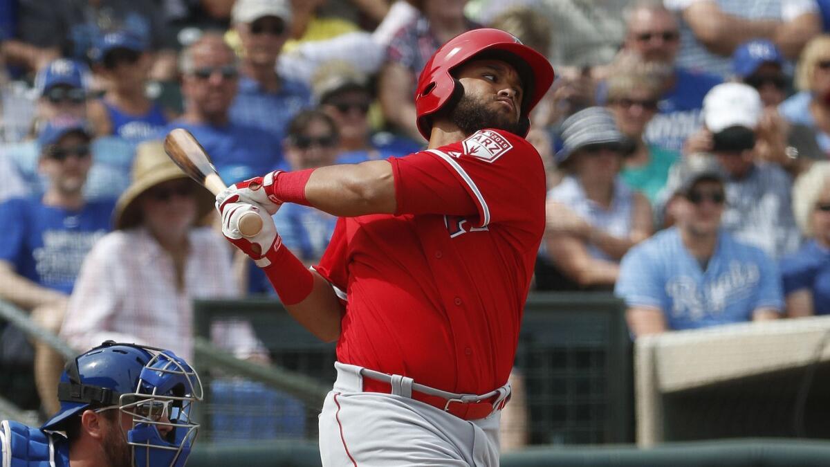 The Angels' Jose Rojas hits against the Royals during a spring training game March 7.