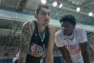 HUSTLE. (L-R) Juancho Hernangomez as Bo Cruz and Anthony Edwards as Kermet Wilts in 'Hustle.'