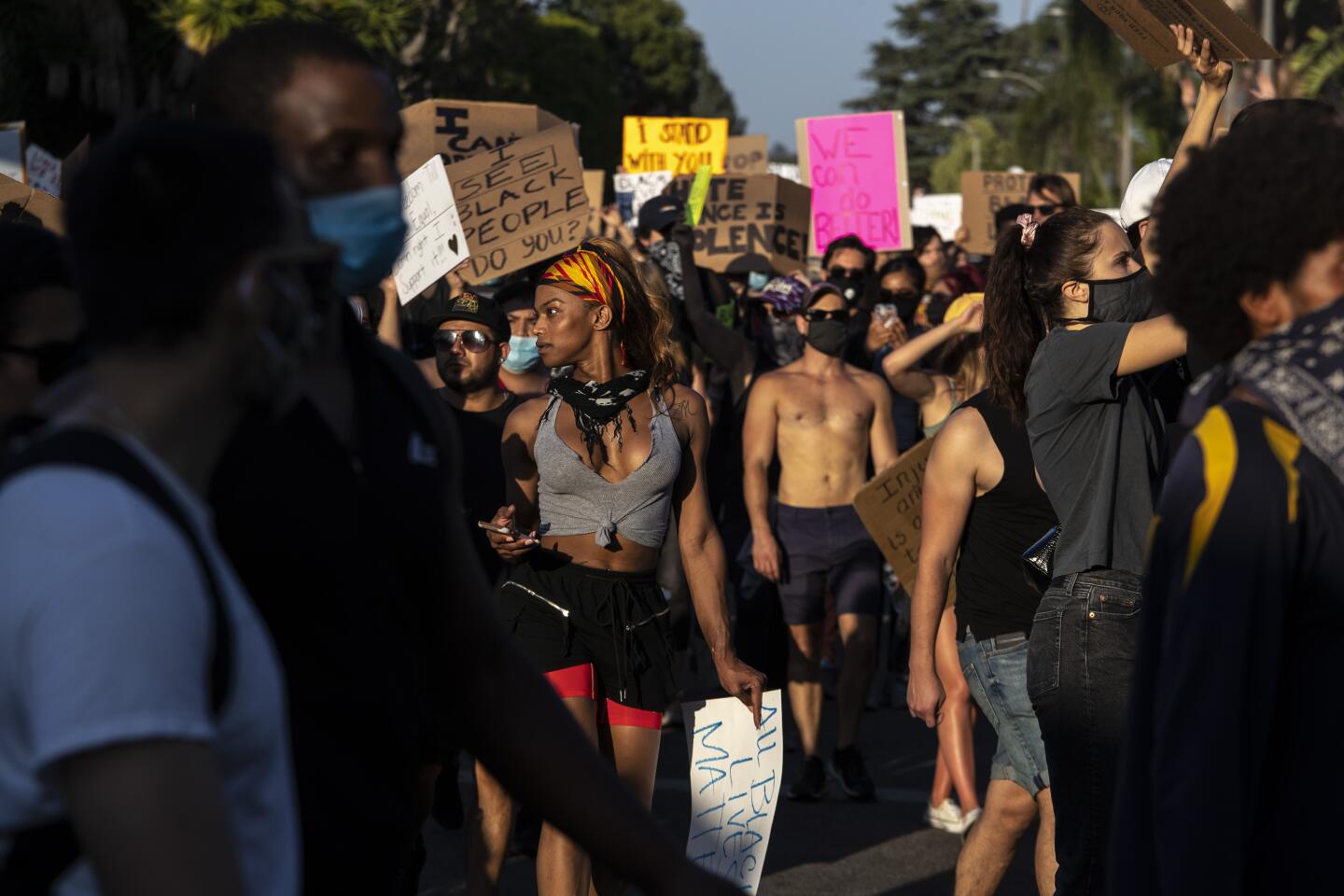 Protesters walk through a residential neighborhood in Hollywood.
