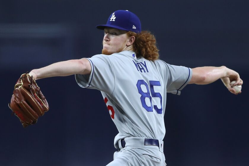 SAN DIEGO, CALIFORNIA - AUGUST 26: Dustin May #85 of the Los Angeles Dodgers pitches during a game against the San Diego Padres at PETCO Park on August 26, 2019 in San Diego, California. (Photo by Sean M. Haffey/Getty Images)