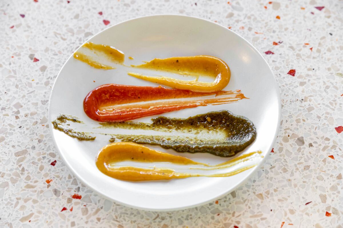 A dish streaked with some of the hot sauces made at Eszett in Silver Lake.