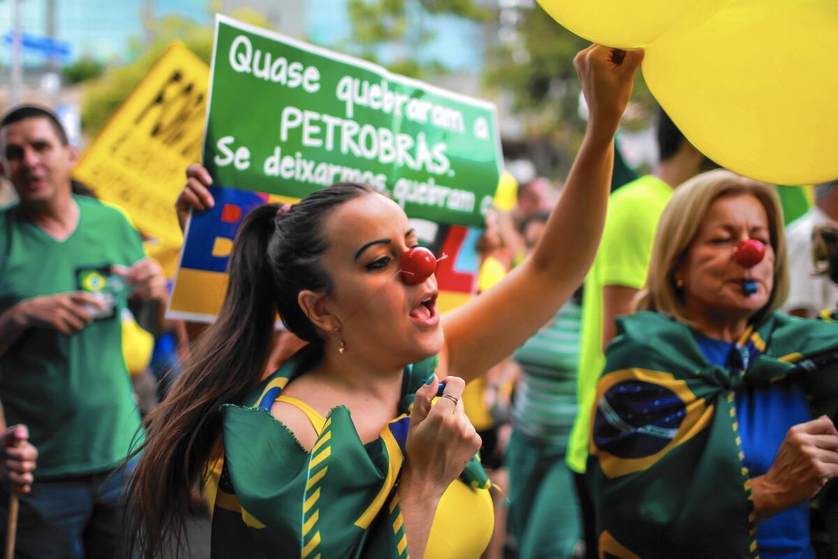Demonstrators protest against Brazilian President Dilma Rousseff in Porto Alegre, Brazil, in April.