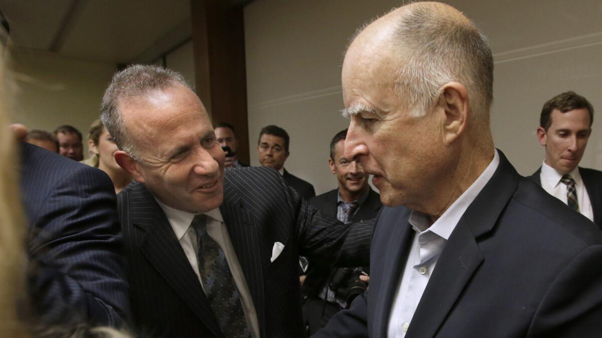 Senate President Pro Tem Darrell Steinberg (D-Sacramento), left, and Gov. Jerry Brown are shown earlier this month. Both expressed support Thursday for providing state aid to immigrant children from Central America.