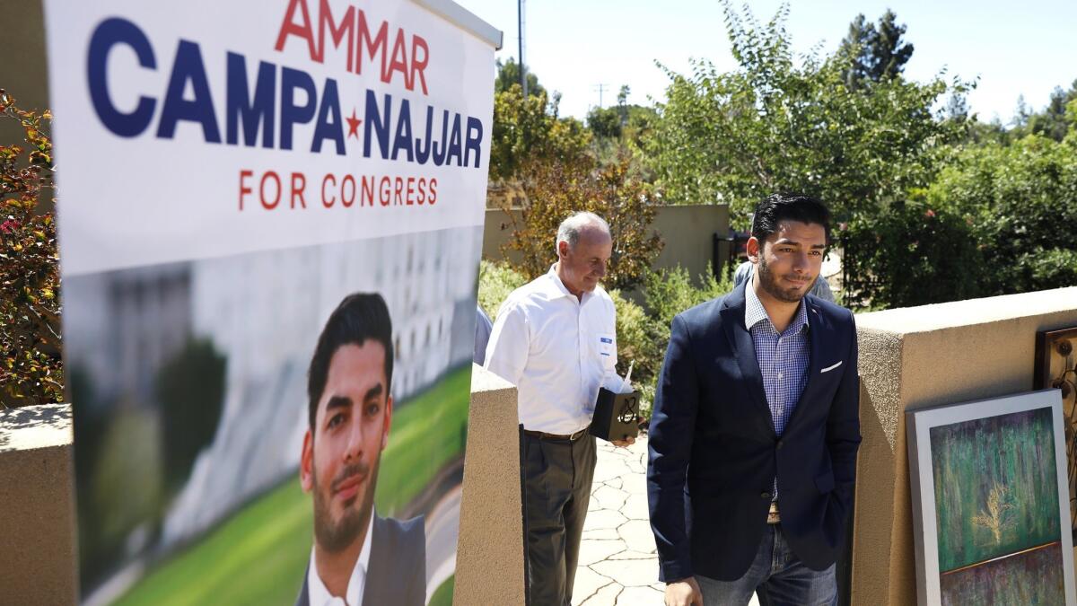 Congressional candidate Ammar Campa-Najjar arrives at a meet and greet in Escondido on Sunday. He's challenging incumbent Rep. Duncan Hunter (R-Alpine), who is fighting campaign finance charges.