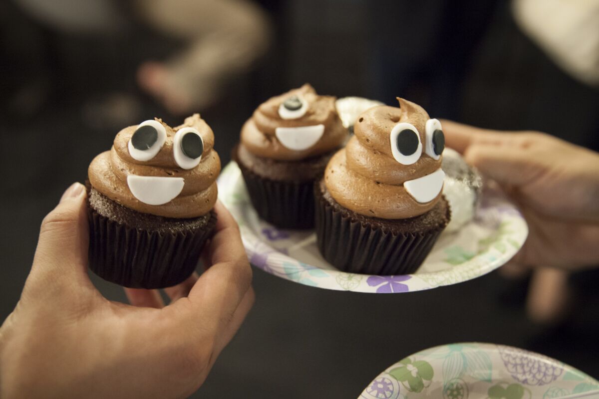 Emoji-themed cupcakes served to attendees at the Emojicon launch party.