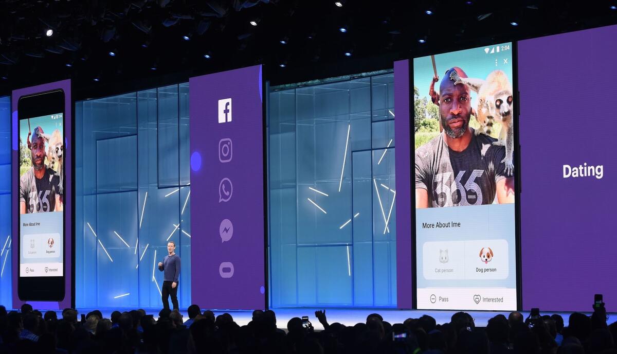 Facebook CEO Mark Zuckerberg speaks during the annual F8 summit in San Jose. Zuckerberg announced that Facebook will soon include a new dating feature and vowed to make privacy protection its top priority.