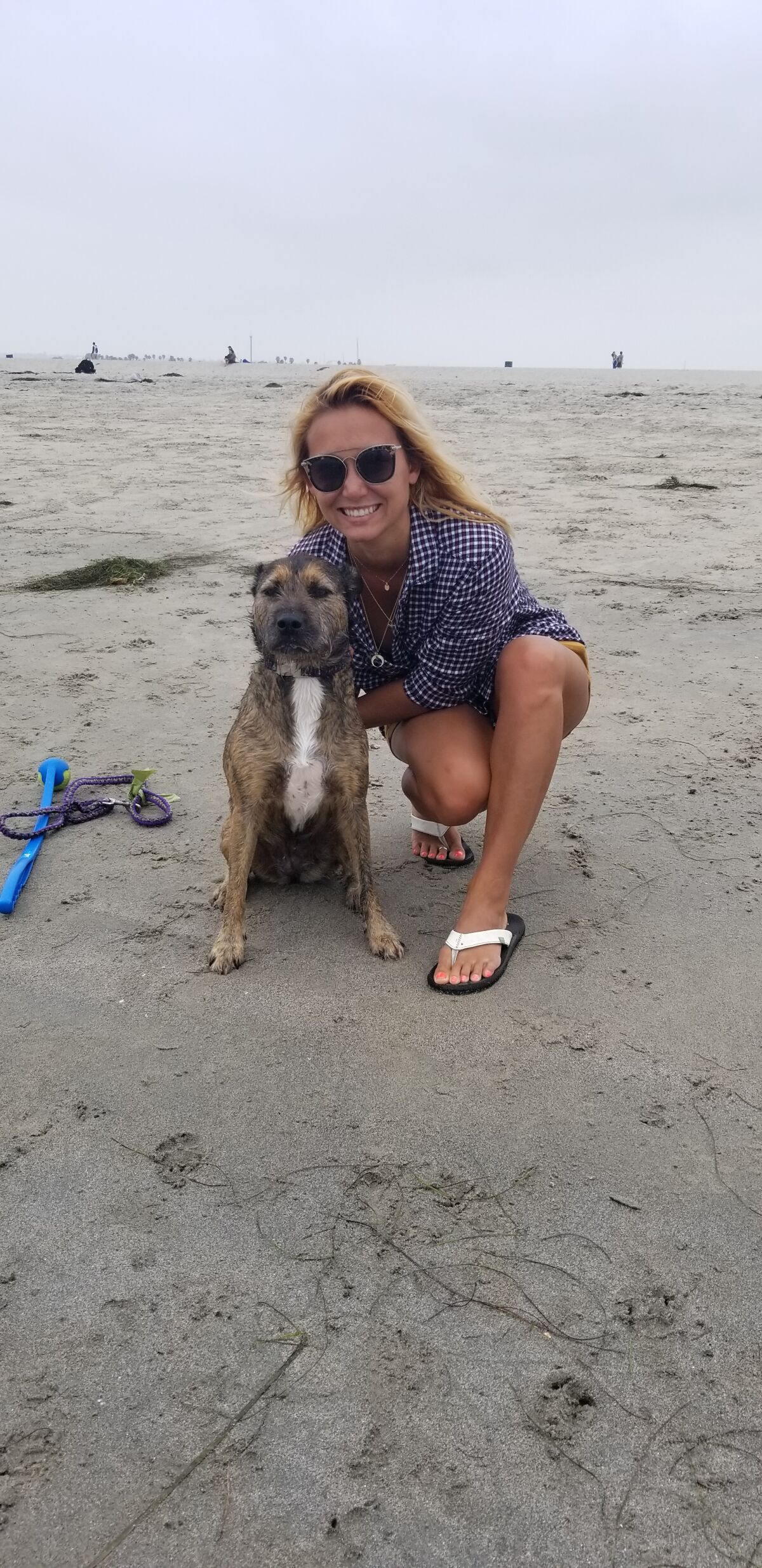 Joanna Sutton spends an afternoon with her dog Kona at Dog Beach in Ocean Beach.