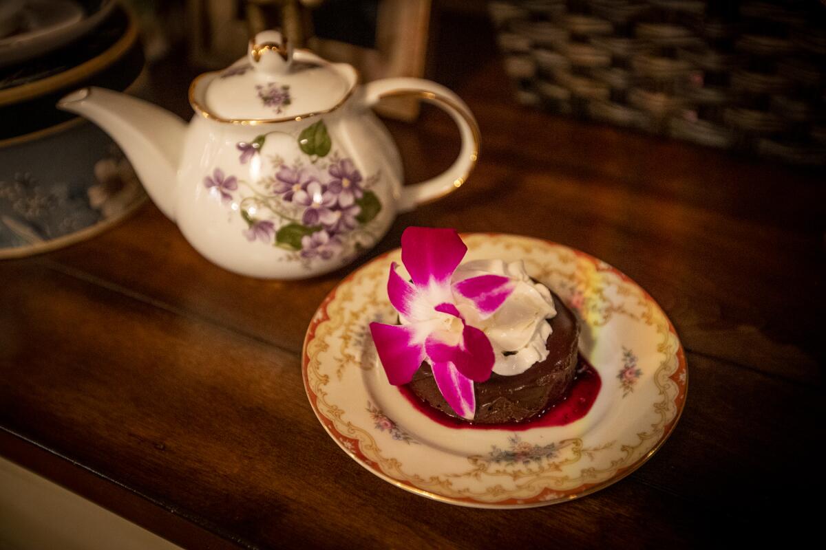 The festive Christmas and holiday tea at the Tea House on Los Rios in San Juan Capistrano includes a fudgy flourless chocolate cake.