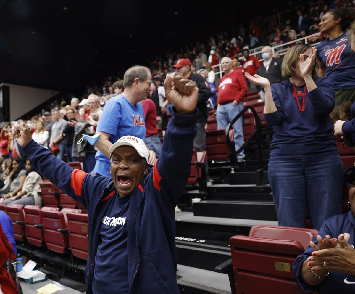 Gladstone McPhee, father of Mississippi head coach Yolett McPhee-McCuin, celebrates the team's win during the second-round college basketball game against Stanford in the women's NCAA Tournament, Sunday, March 19, 2023, in Stanford, Calif. (AP Photo/Josie Lepe)