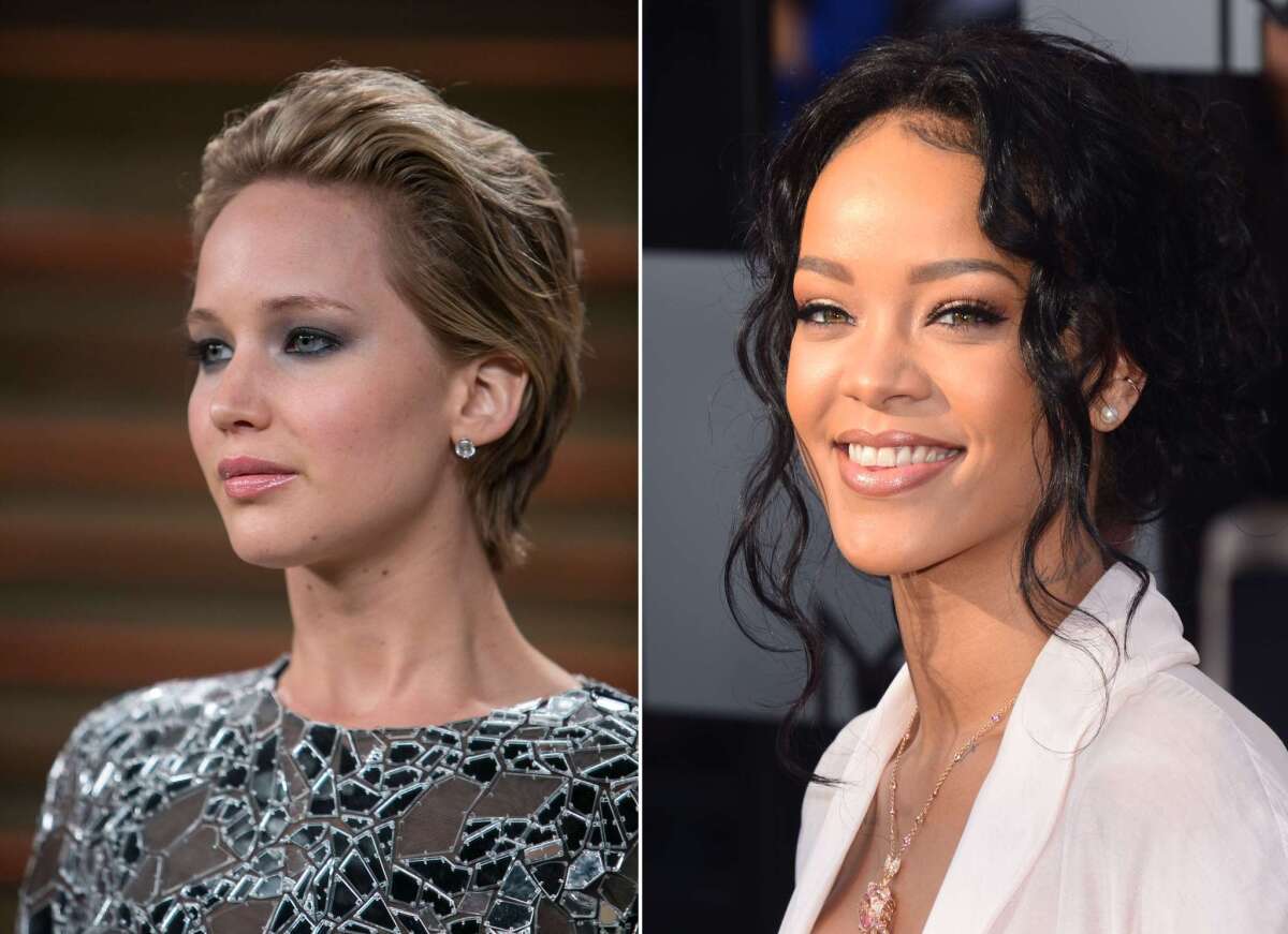 Oscar winner Jennifer Lawrence, left, seen at the 2014 Vanity Fair Oscar Party in West Hollywood in March, and pop star Rihanna, seen at the 2014 MTV Movie Awards at the Nokia Theater in Los Angeles in April.
