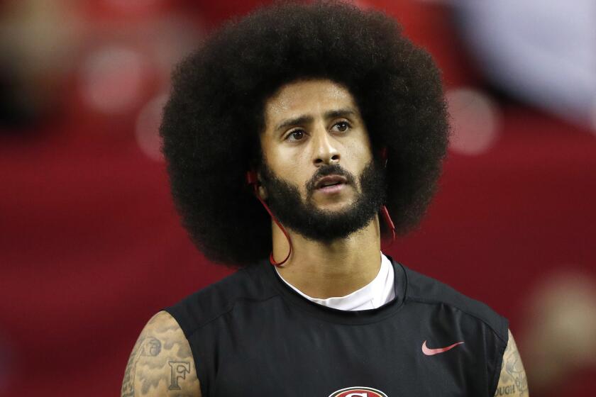 San Francisco 49ers quarterback Colin Kaepernick warms up before the first half of an NFL football game between the Atlanta Falcons and the San Francisco 49ers, Sunday, Dec. 18, 2016, in Atlanta. (AP Photo/John Bazemore)