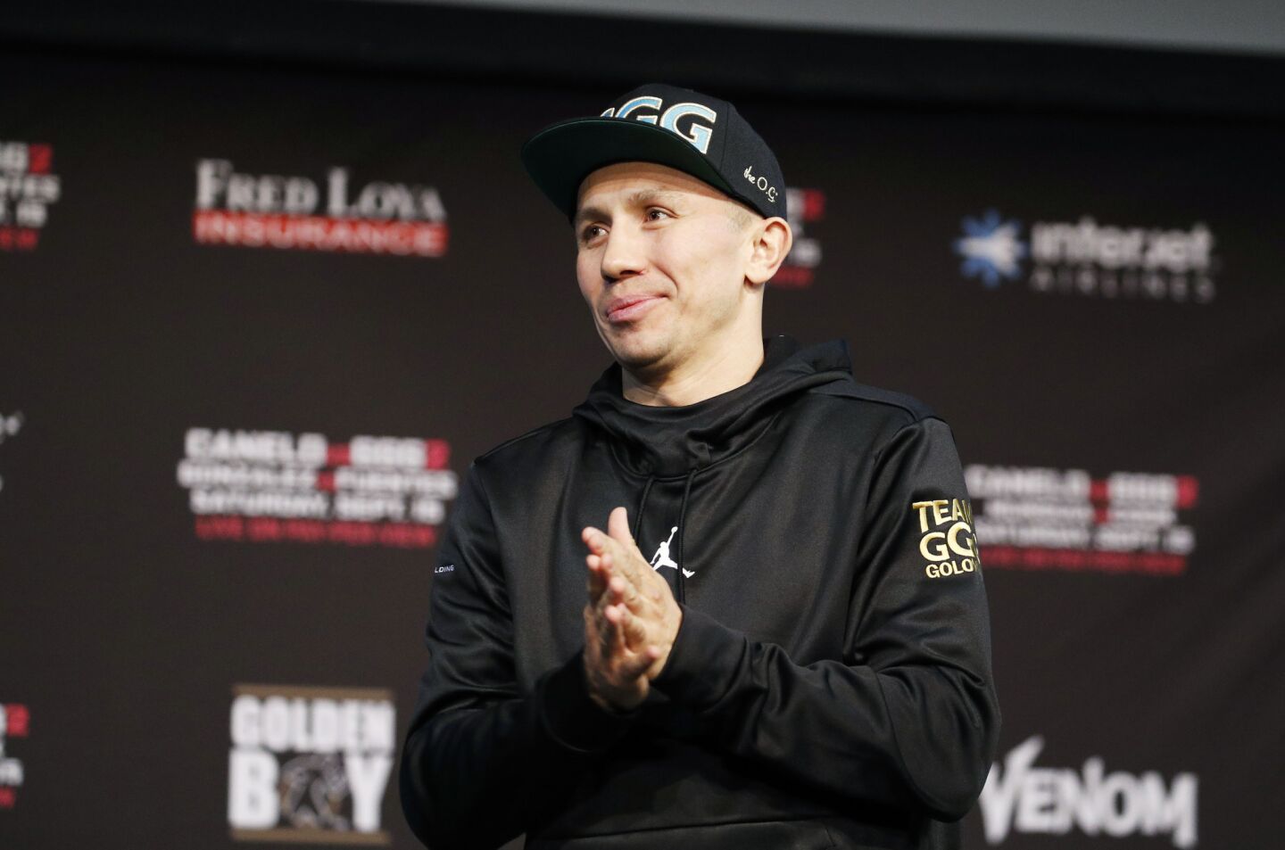 Gennady Golovkin gestures during a news conference with Canelo Alvarez, Wednesday, Sept. 12, 2018, in Las Vegas. The two are scheduled to fight in a title bout Saturday in Las Vegas. (AP Photo/John Locher)