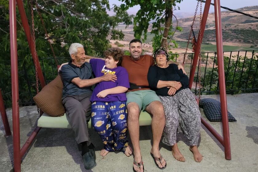 Mervan's father, Abdullah Ergun, Mervan's son Grant-Abdullah Ergun and Ergun's mother, Fatma.