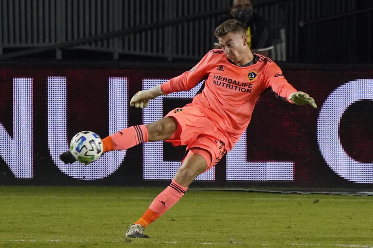 Galaxy goalkeeper Jonathan Klinsmann kicks the ball during a match 