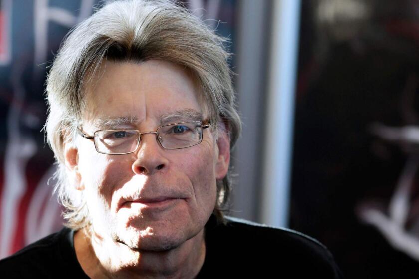 (FILES) In this file photo taken on November 13, 2013 American author Stephen King poses for photographers in Paris, before a book signing event dedicated to the release of his book "Doctor Sleep", the sequel to his 1977 novel "The Shining". - When Stephen King's local newspaper, under financial pressure, announced it would cut regional book reviews, the horror author swooped in -- and managed to save the section with just a few tweets. The story began on January 11, 2019, when King shared that The Portland Press Herald, a prominent newspaper in his home state of Maine, would no longer publish locally-written reviews of books set in the northeasternmost US state."Tell the paper DON'T DO THIS," tweeted the 71-year-old author, a master of horror and fantasy known for such novels as "Carrie" and "The Shining." (Photo by Kenzo TRIBOUILLARD / AFP)KENZO TRIBOUILLARD/AFP/Getty Images ** OUTS - ELSENT, FPG, CM - OUTS * NM, PH, VA if sourced by CT, LA or MoD **