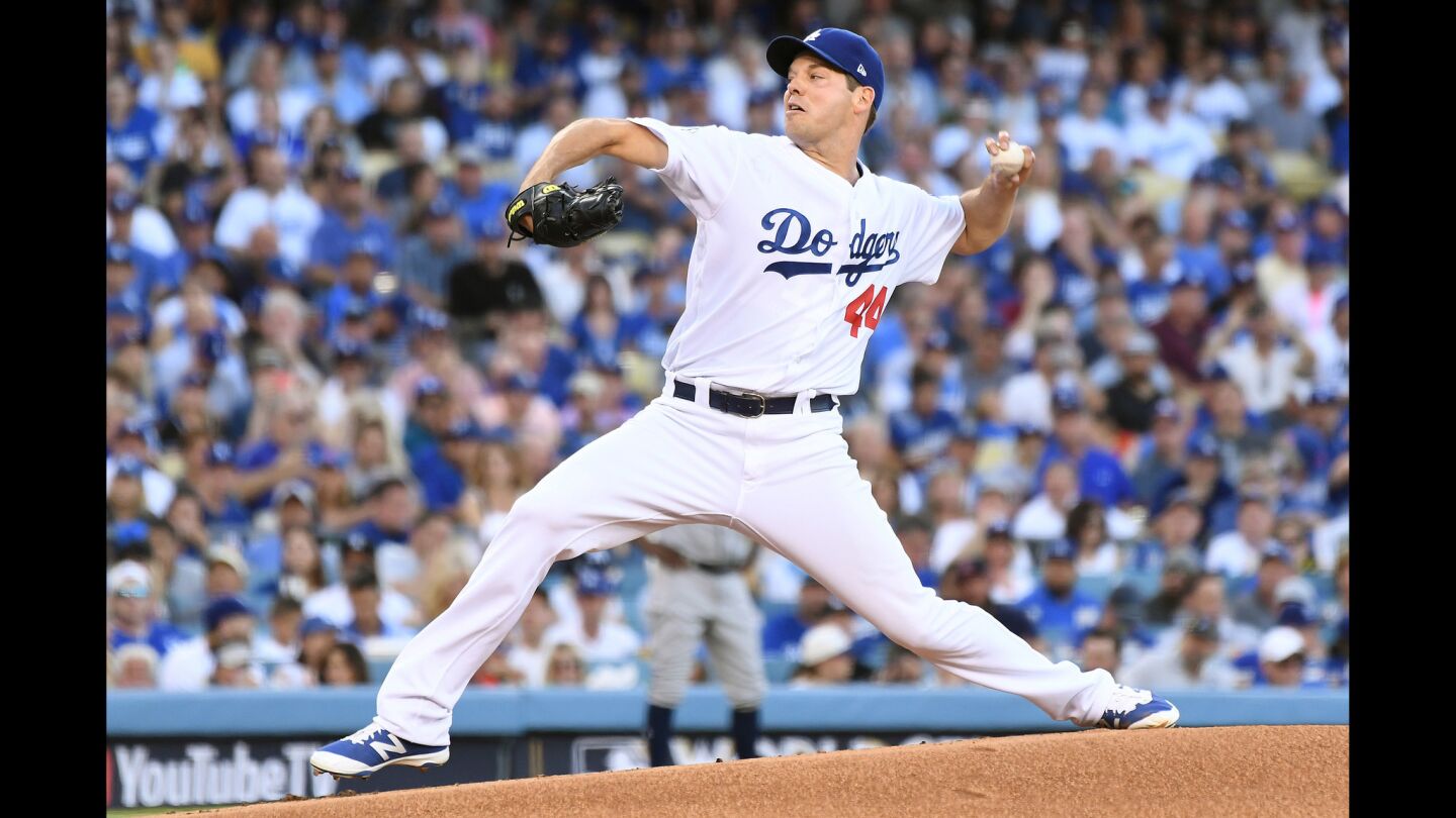 Rich Hill delivers a pitch during the first inning of Game 2. Hill would work four innings, giving up one run on three hits, all in the third inning, while striking out seven.